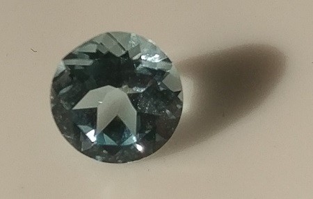 6mm round-cut, Sky Blue Topaz Facets