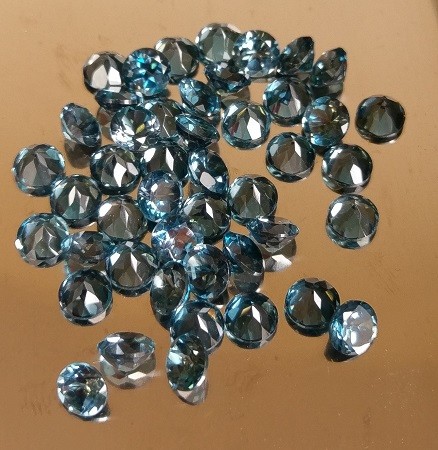 6mm round-cut, London blue faceted topaz