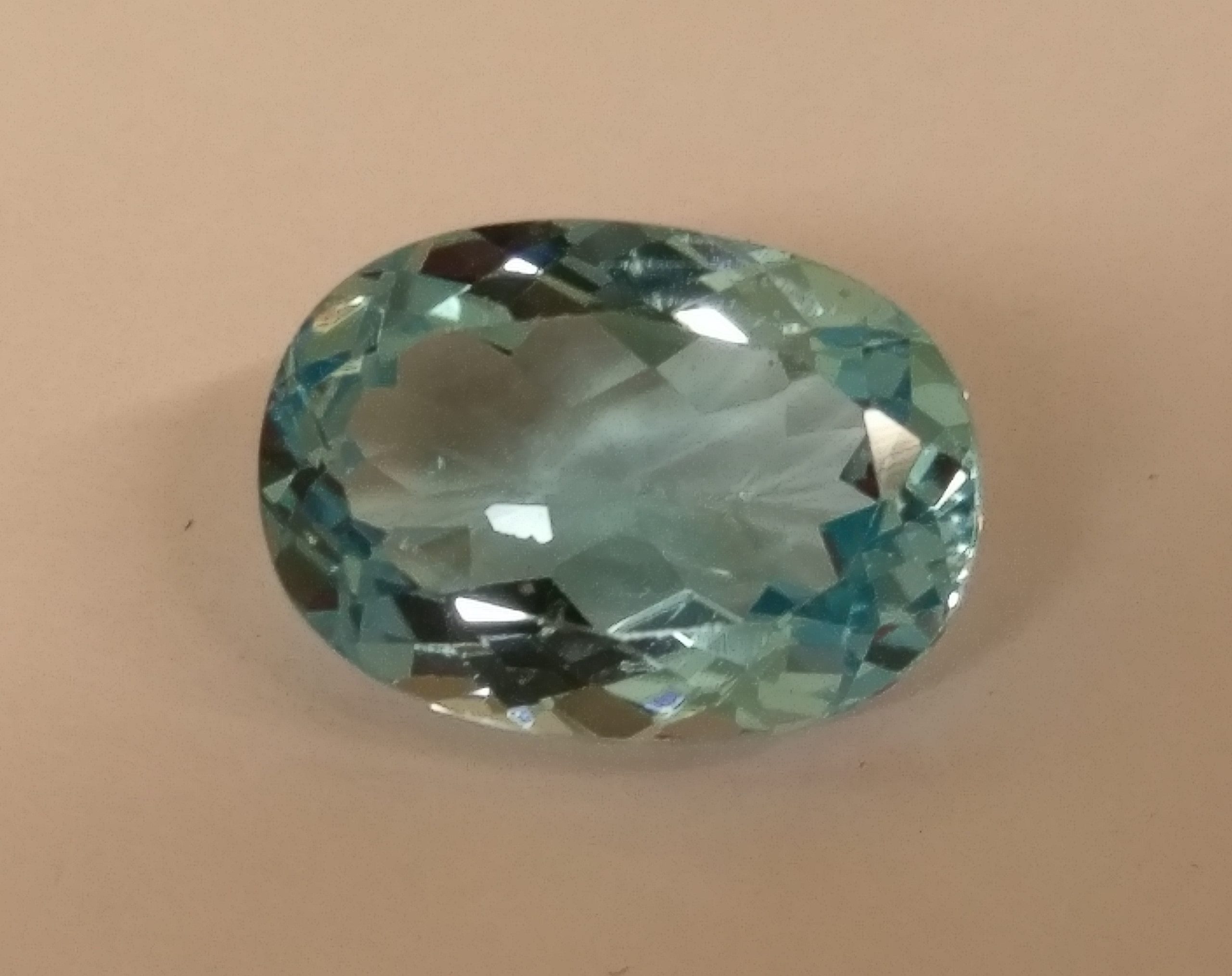 14x10mm oval-cut, Sky Blue Topaz Facets