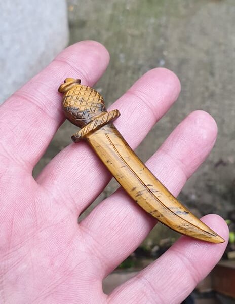 A hand-carved tiger-eye sword #4