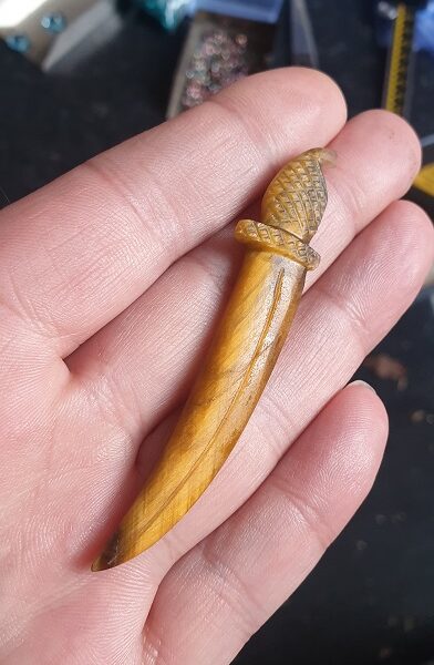 A hand-carved tiger-eye sword #13