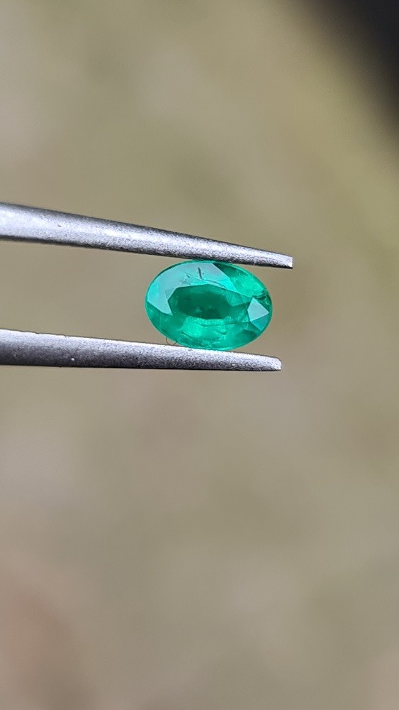 5.9x4.1mm oval-cut Brazilian emerald facet AA grade