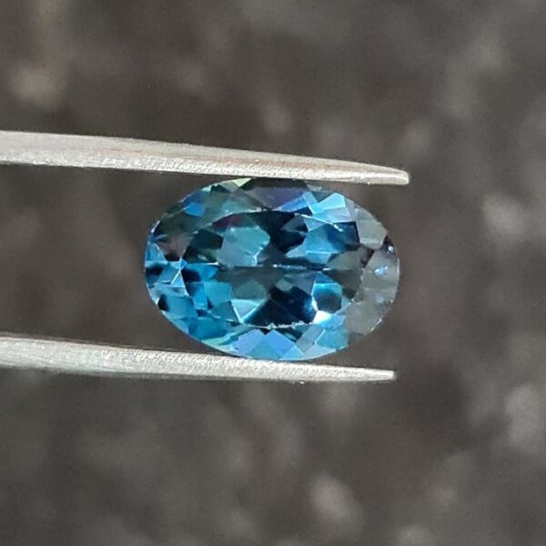 14x10mm oval-cut London-blue topaz facet