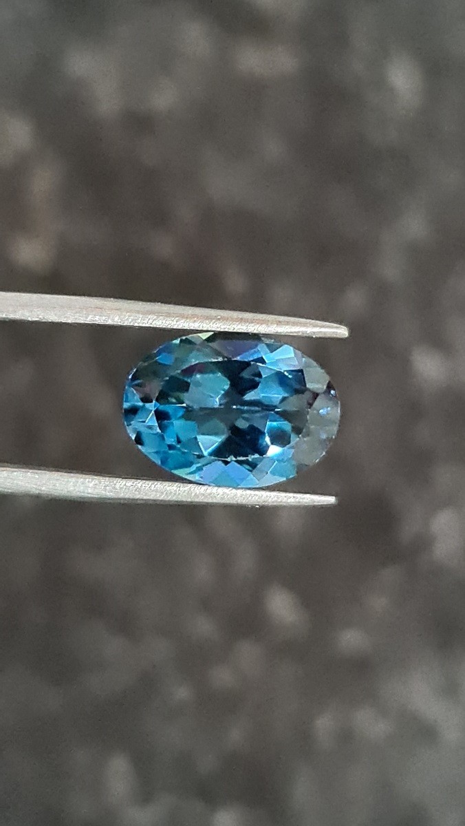 14x10mm oval-cut London-blue topaz facet
