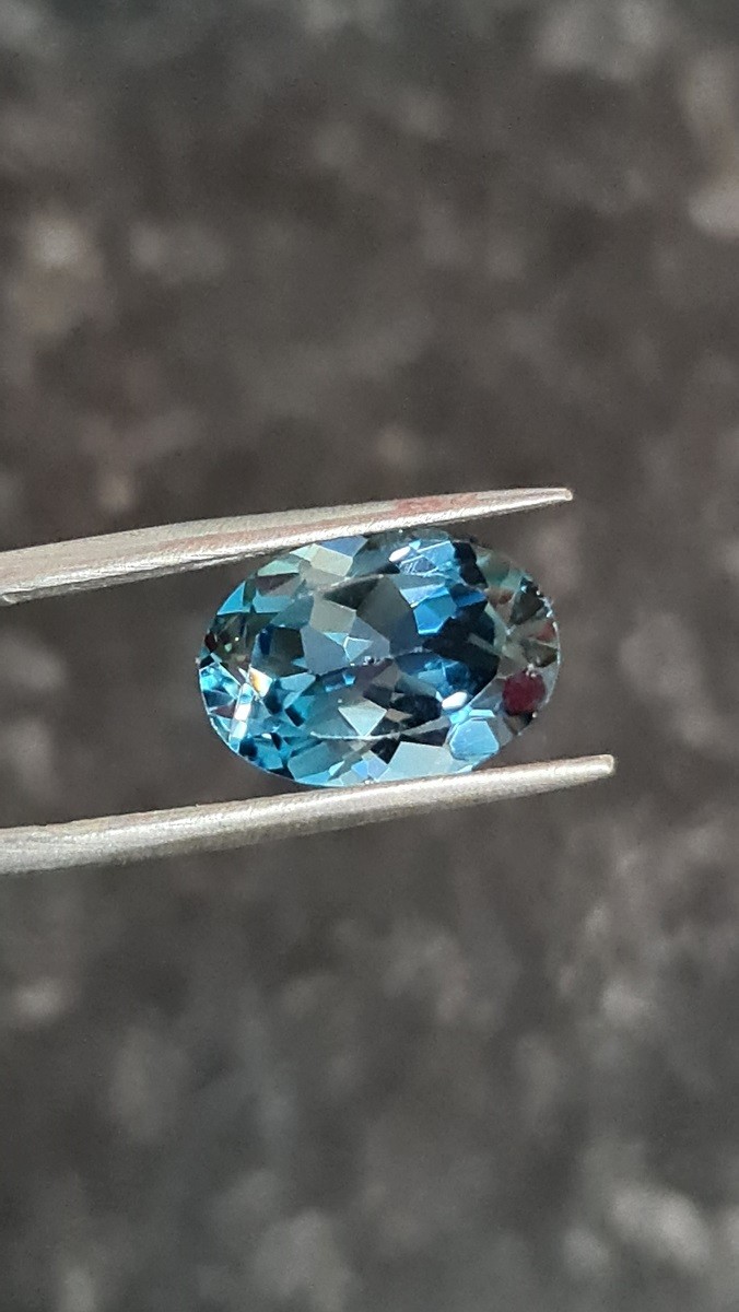 14x10mm oval-cut London-blue topaz facets