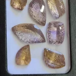 Your precious gems 82ct parcel of high quality ametrine/amethyst carved facets