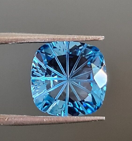 12x12mm carved-back Swiss blue topaz facet