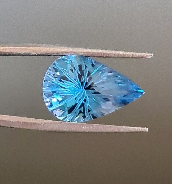 15x10mm carved-back Swiss blue topaz facet