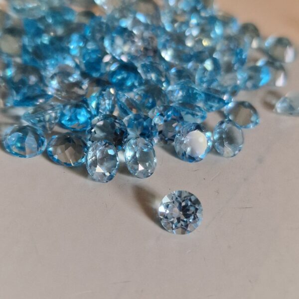Single 5mm round Swiss blue topaz facet