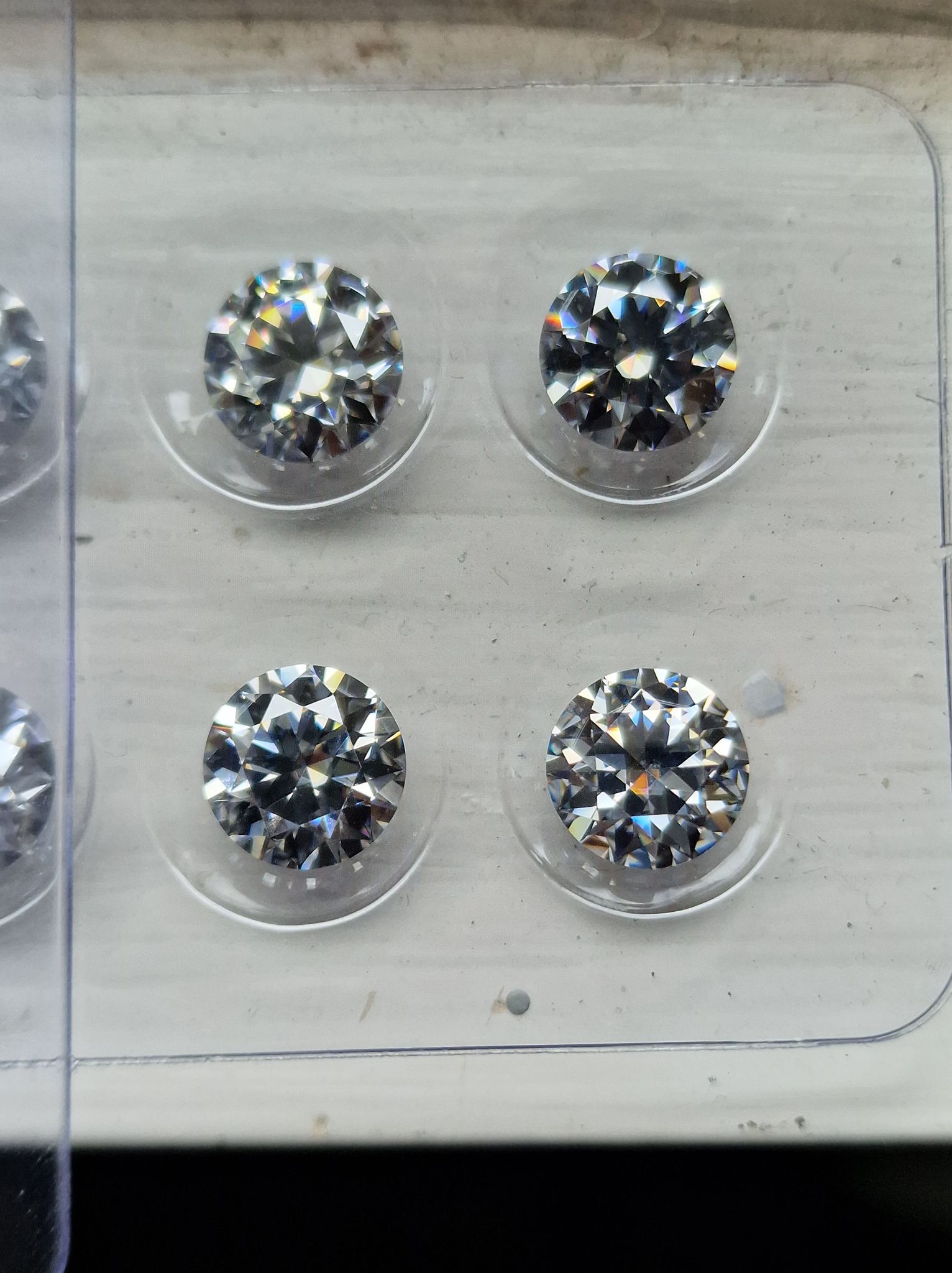 Single 8mm round-cut GREY moissanite facet