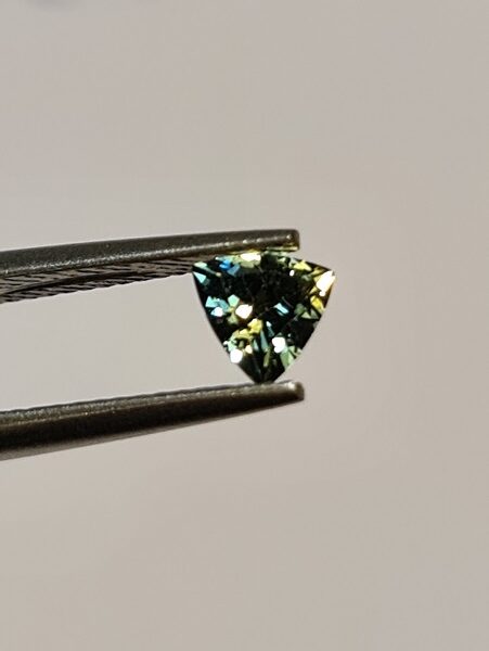 4.9x4.9x2.9mm Australian trillion parti sapphire facet