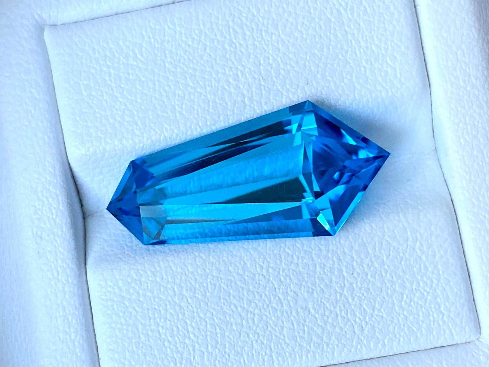 24.10x11.27x8.27mm precision-cut swiss blue topaz facet