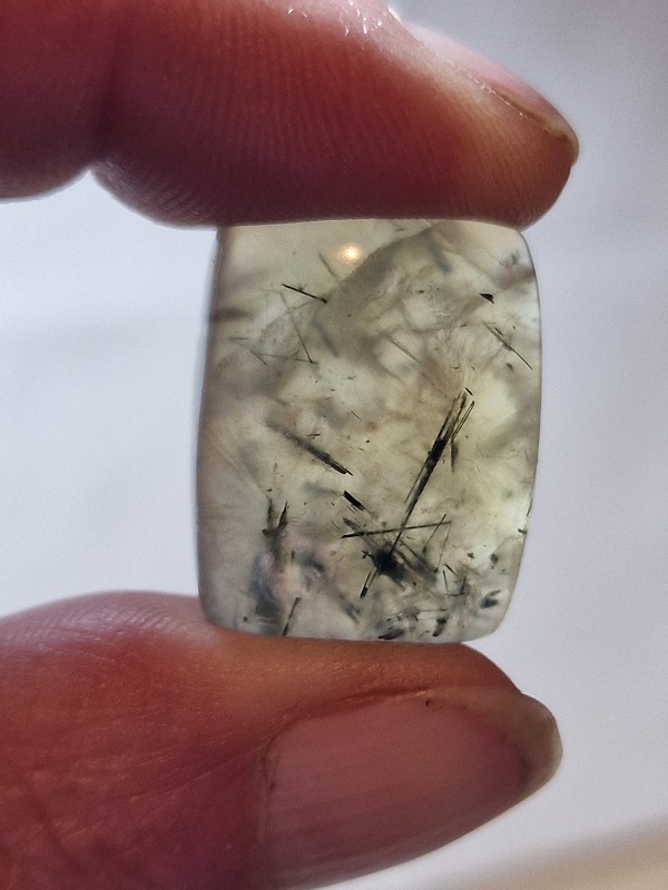 24x19mm prehnite cabochon with rutile inclusions