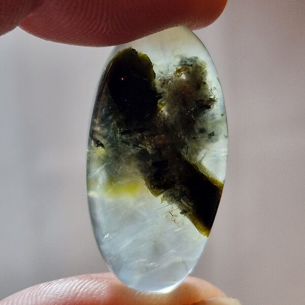 35x17mm prehnite cabochon with rutile inclusions