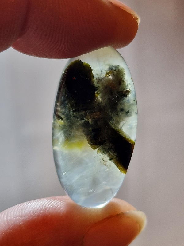35x17mm prehnite cabochon with rutile inclusions