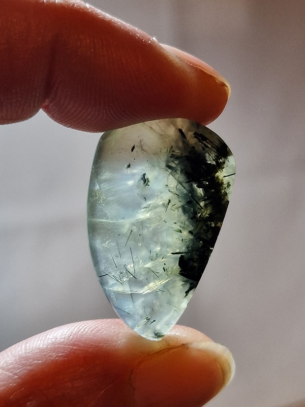 34x20mm prehnite cabochon with rutile inclusions