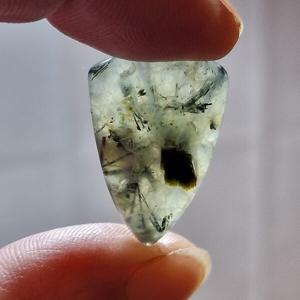 28x20mm prehnite cabochon with rutile inclusions