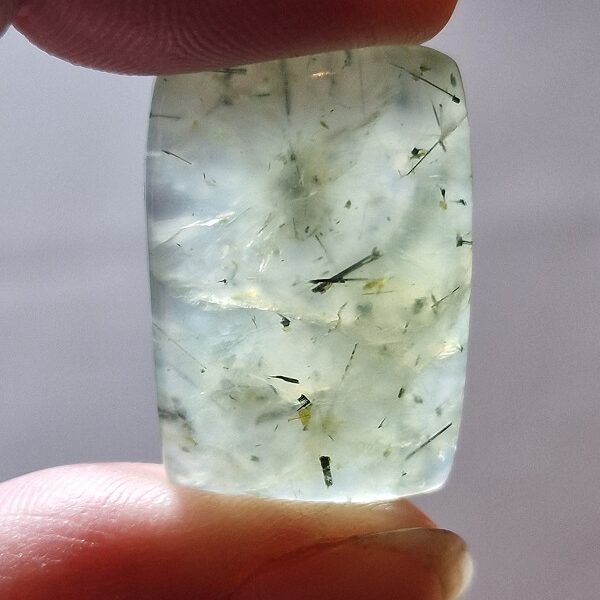 29x20mm prehnite cabochon with rutile inclusions