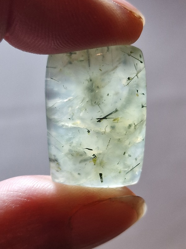 29x20mm prehnite cabochon with rutile inclusions