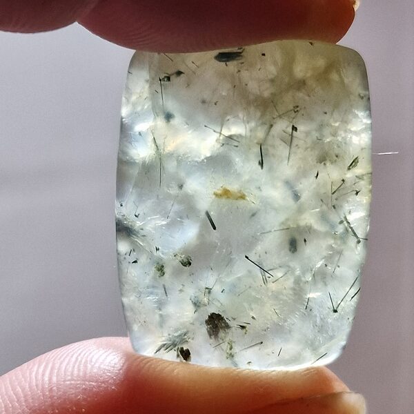 30x23mm prehnite cabochon with rutile inclusions