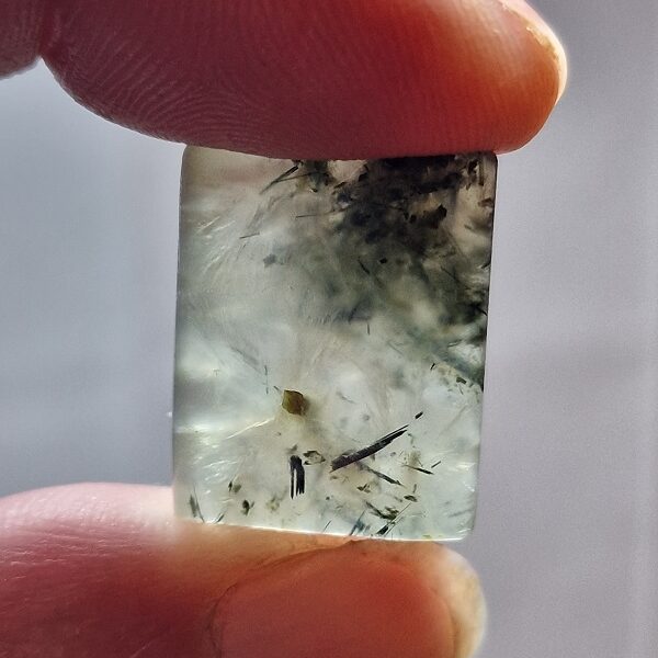 22x17mm prehnite cabochon with rutile inclusions
