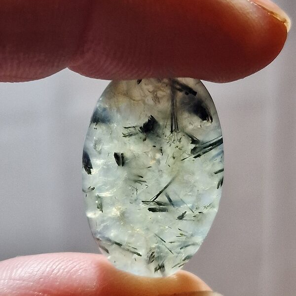 28x17mm prehnite cabochon with rutile inclusions