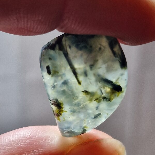 26x19mm prehnite cabochon with rutile inclusions