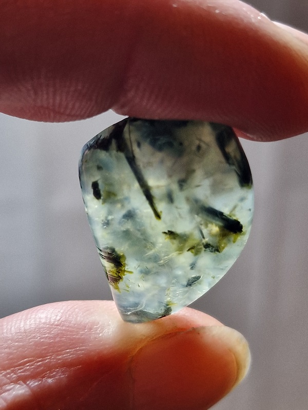 26x19mm prehnite cabochon with rutile inclusions