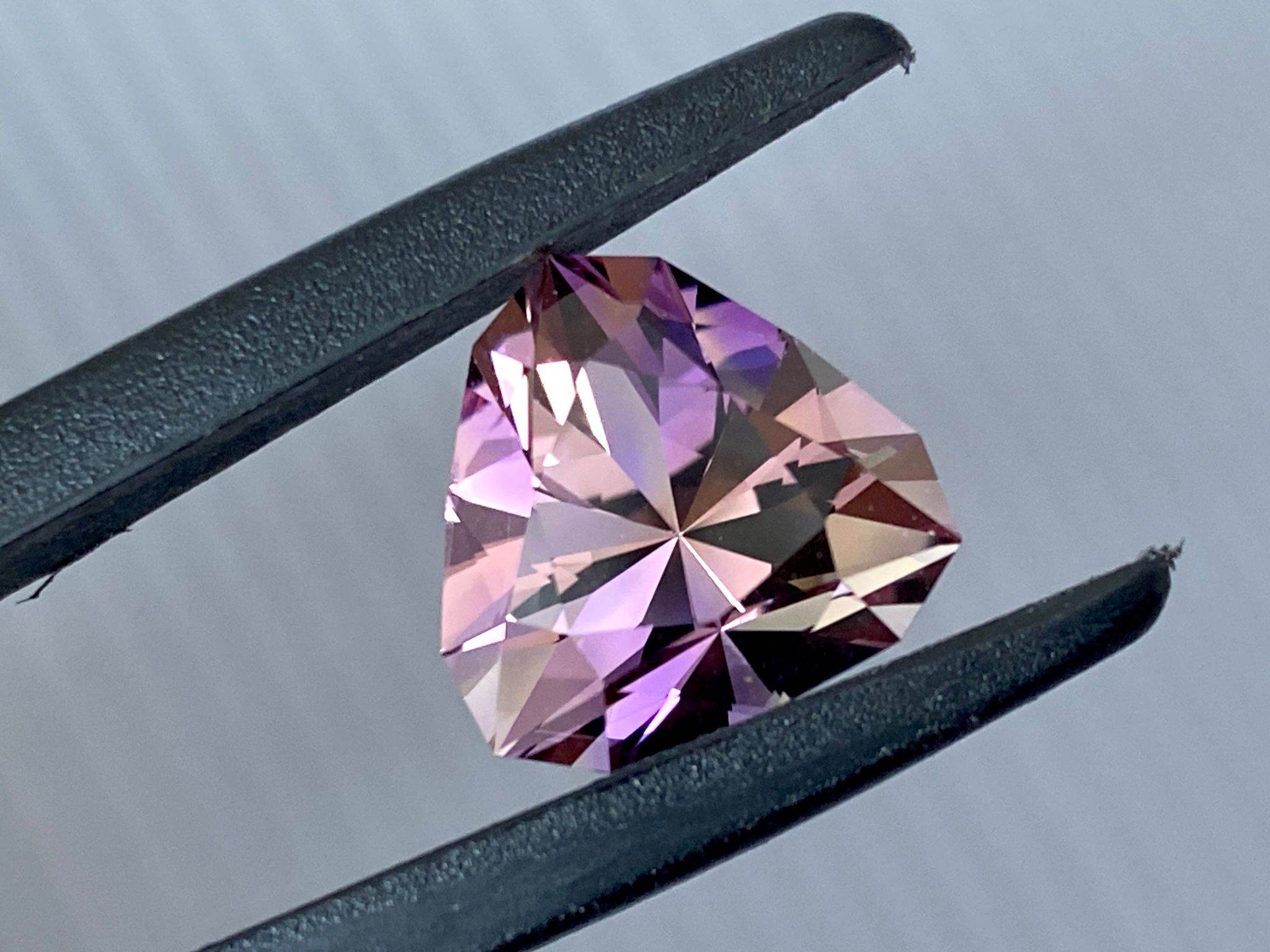 13.27x13.56x10.53mm precision-cut ametrine facet