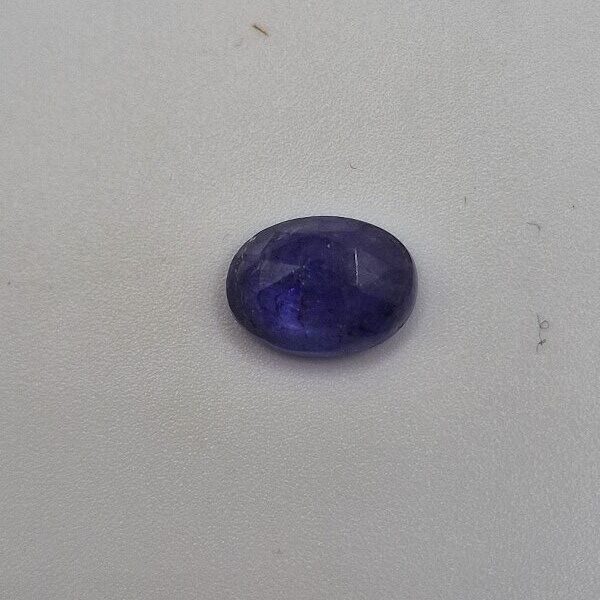 10.47x7.79x5.35mm rose-cut tanzanite cabochon