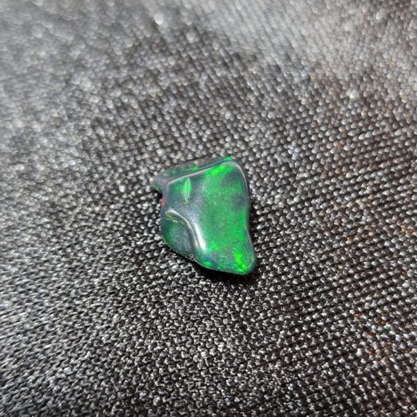 14.0x8.5x5.6mm Ethiopian black opal polished freeform