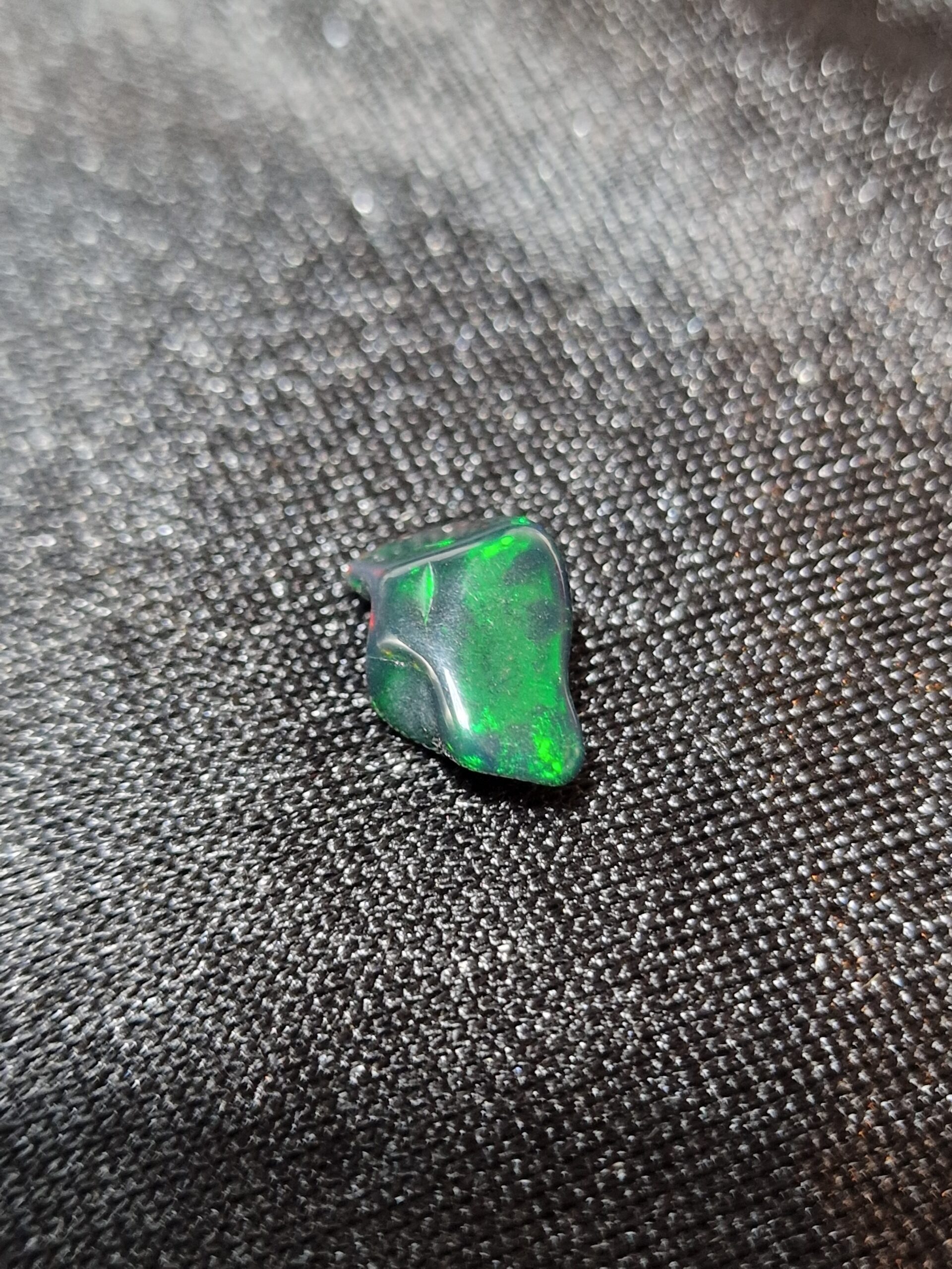 14.0x8.5x5.6mm Ethiopian black opal polished freeform
