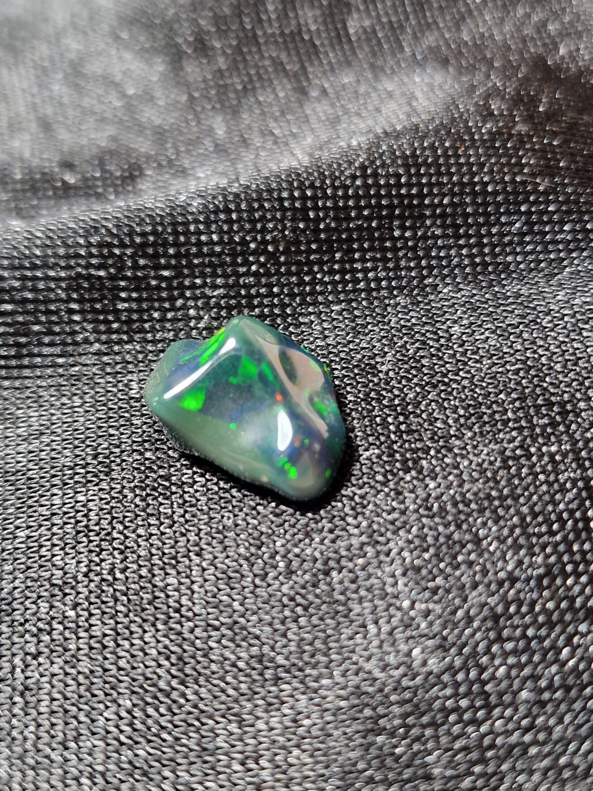 14.4x9.5x7.1mm Ethiopian black opal polished freeform