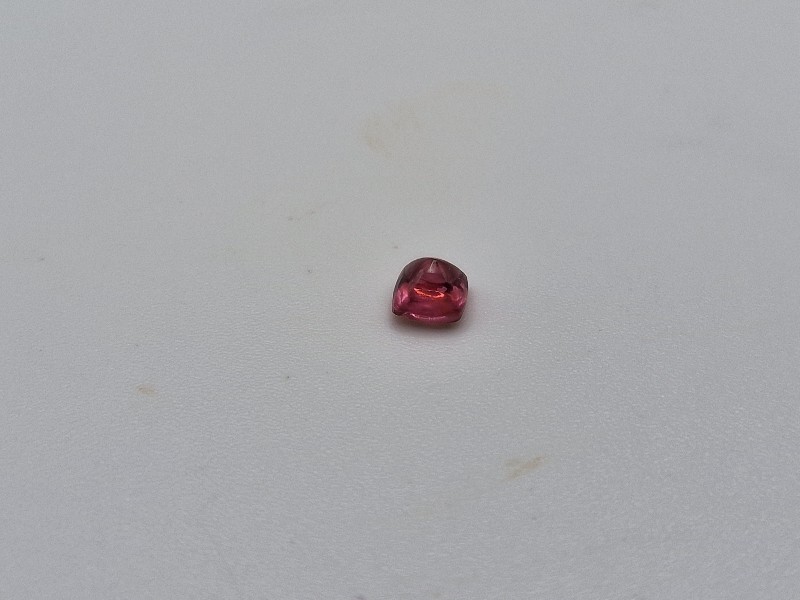 3.89x3.75x2.93mm spinel sugarloaf-cut cabochon