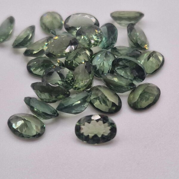 6x4mm oval green apatite facet