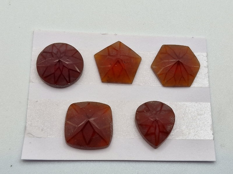 Geometric rose-cut garnet cabochon parcel