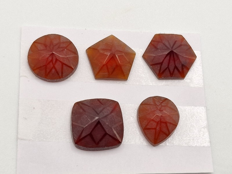 Geometric rose-cut garnet cabochon parcel