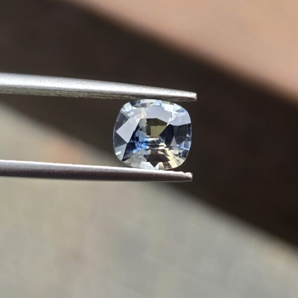 6.90x6.30x3.81mm cushion-cut, bi-colour sapphire facet
