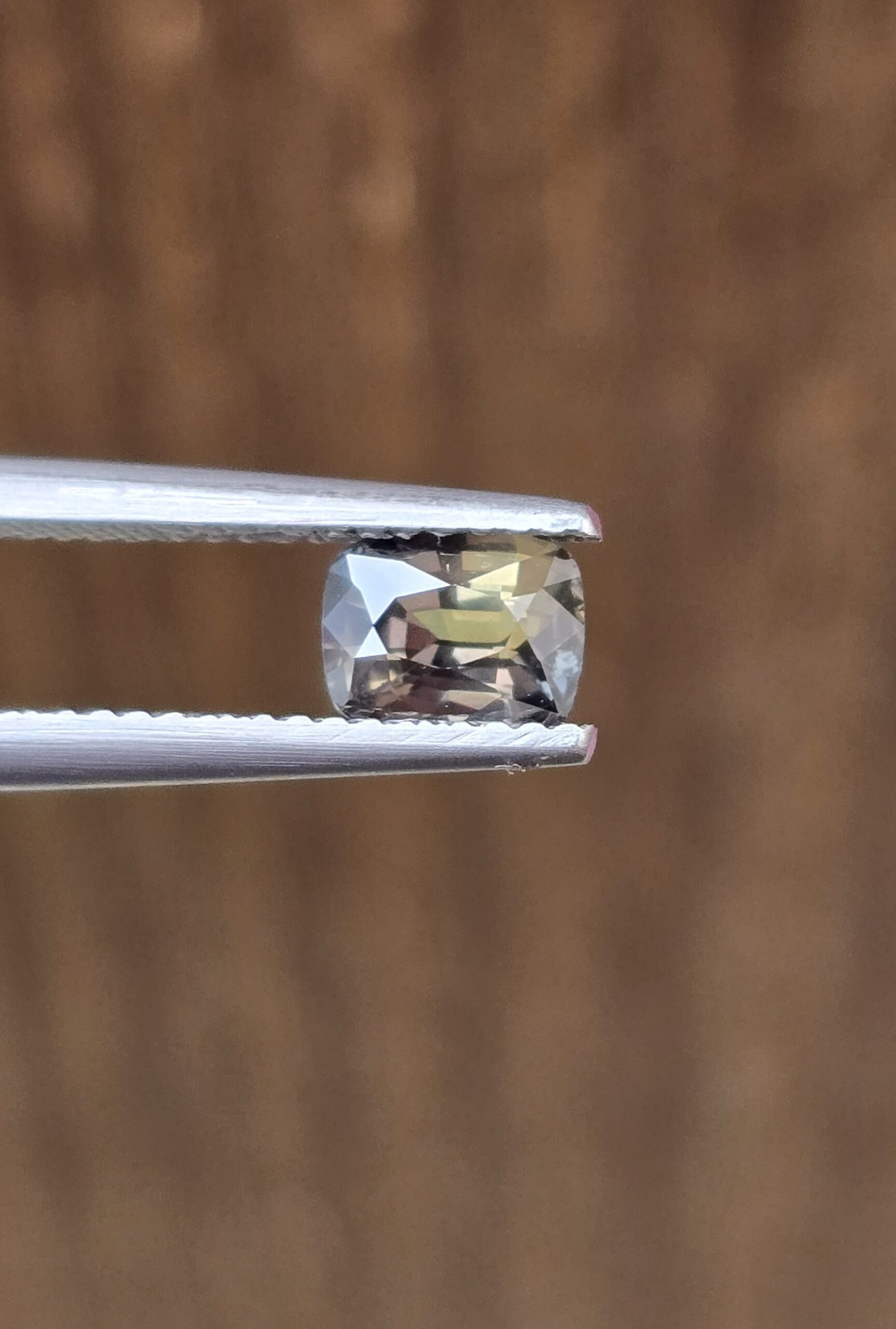 6.24x4.81x3.64mm cushion yellow/green sapphire facet