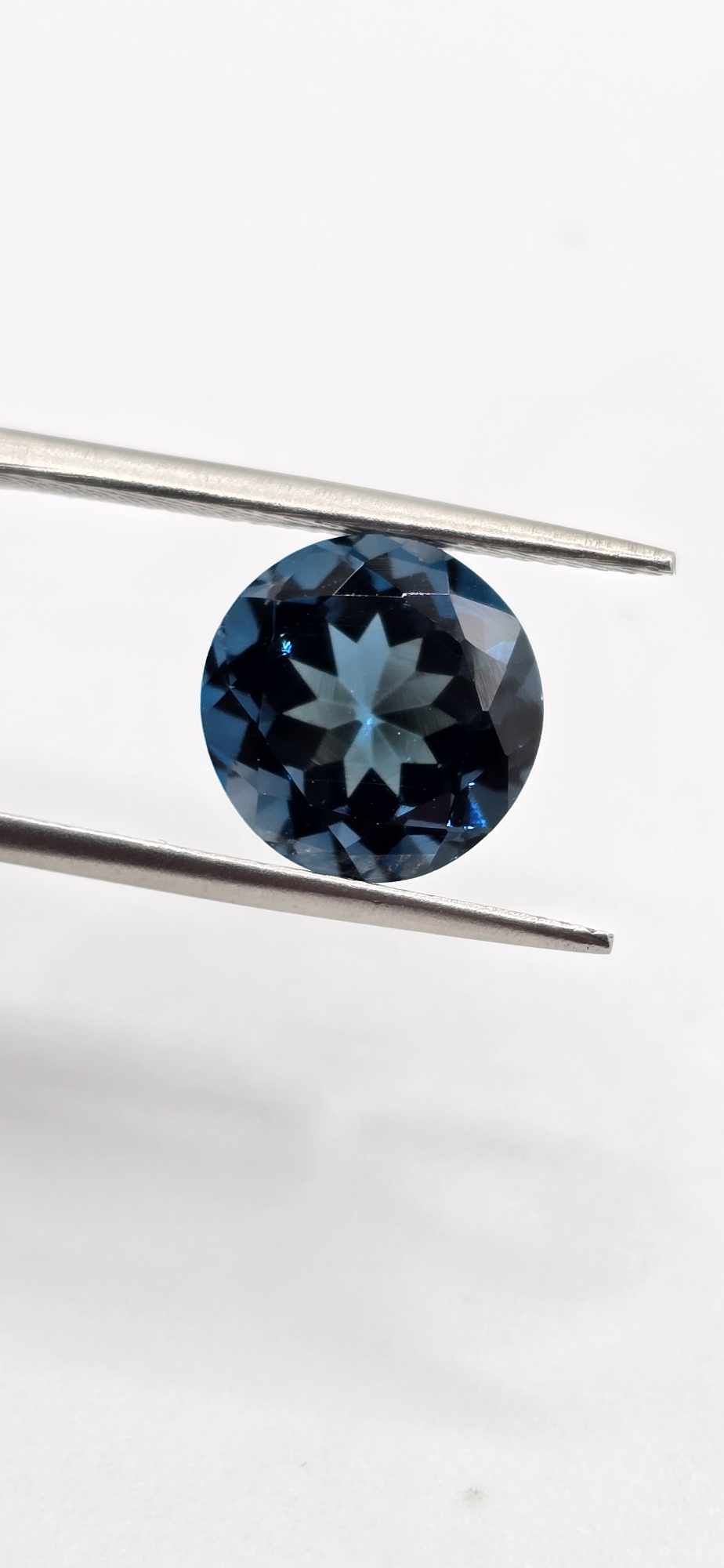 12mm round-cut, London blue faceted topaz
