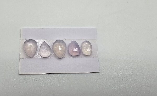 FIVE rose-cut lavender quartz cabochons