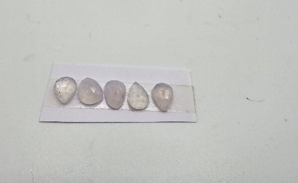 FIVE rose-cut lavender quartz cabochons
