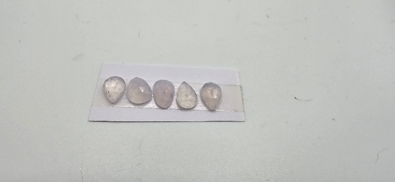 FIVE rose-cut lavender quartz cabochons