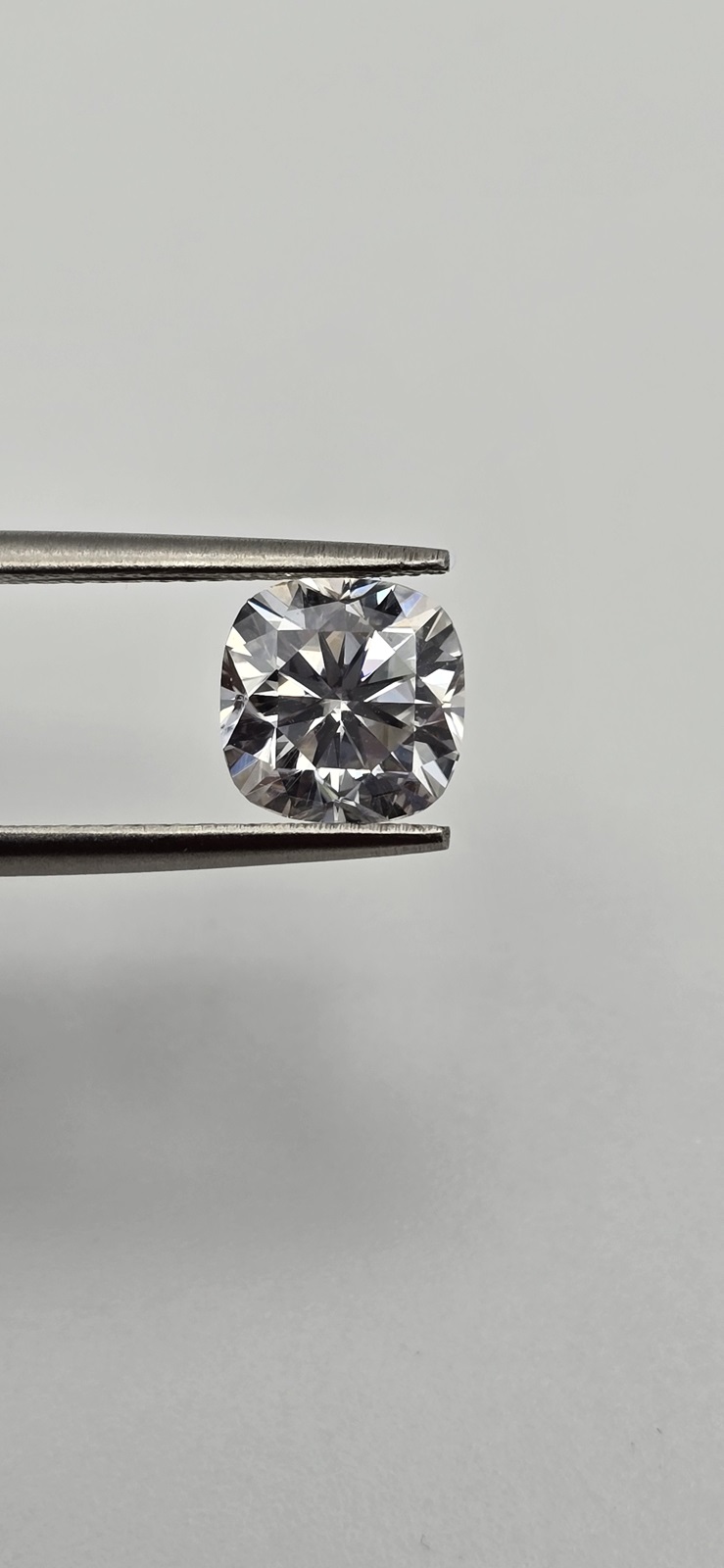 5mm cushion-cut bright white moissanite facet - budget line