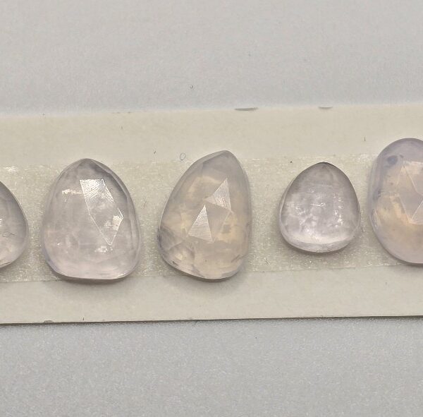 FIVE rose-cut lavender quartz cabochons