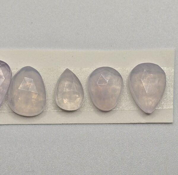 FIVE rose-cut lavender quartz cabochons