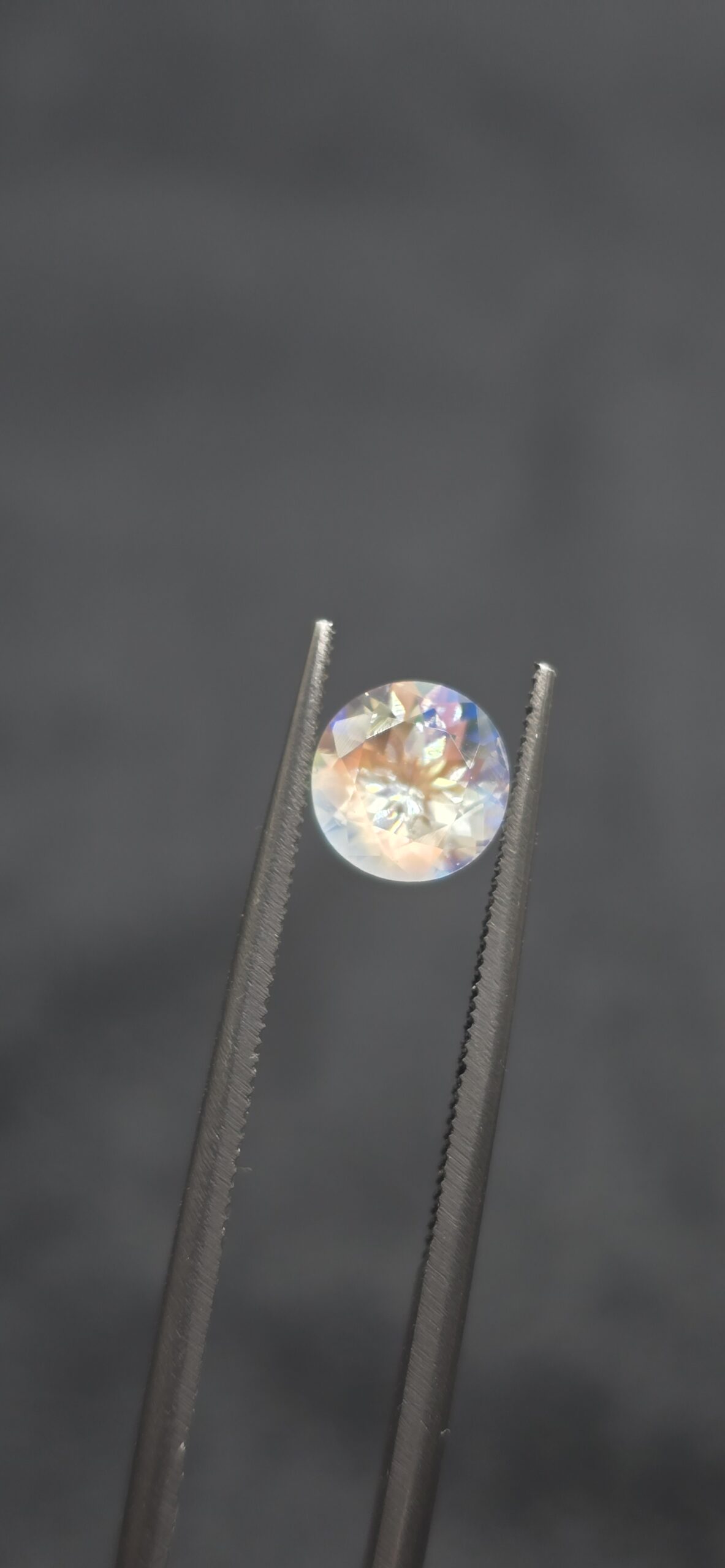 7.09x5.85mm round gem-grade rainbow moonstone facet