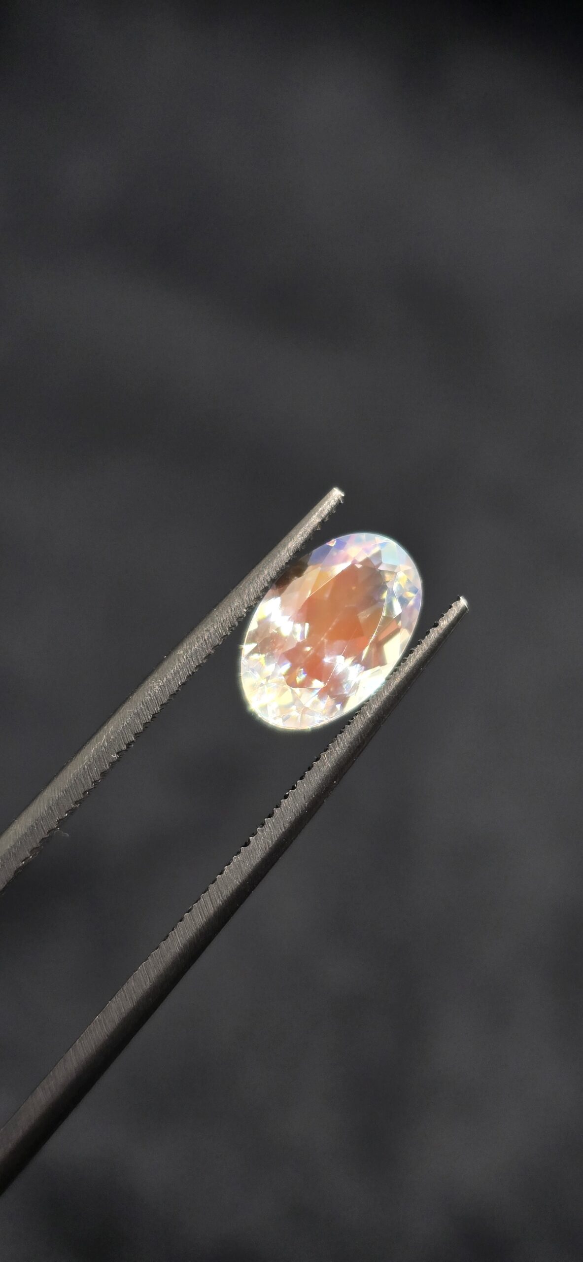 10.01x6.56x4.27mm gem-grade rainbow moonstone facet