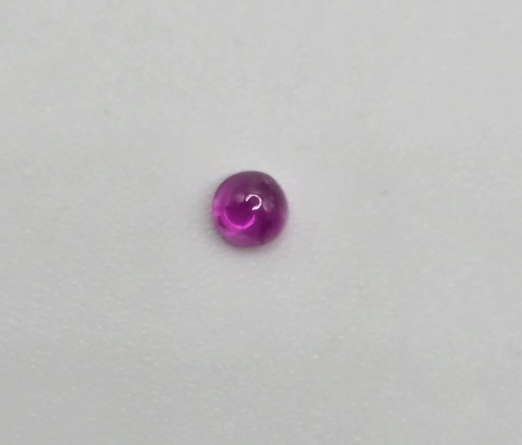 3.03mm round high quality Mozambique ruby cabochon