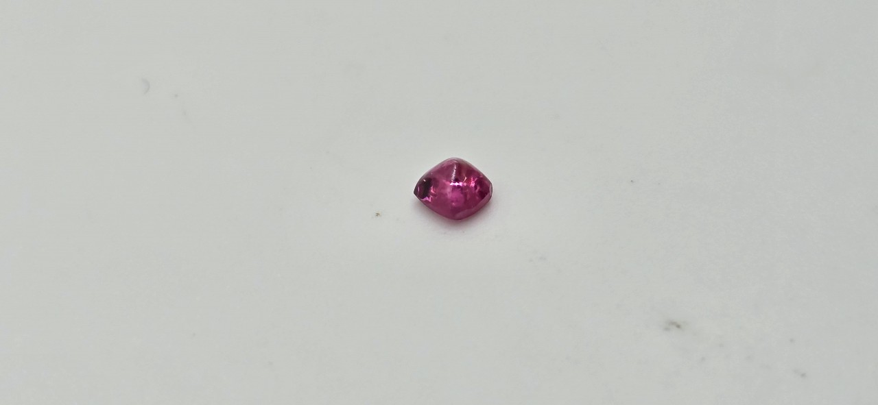 3.56x3.43x2.59mm spinel sugarloaf-cut cabochon